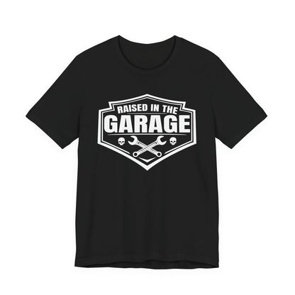 Black t-shirt with 'Raised in the Garage' graphic design on a white background