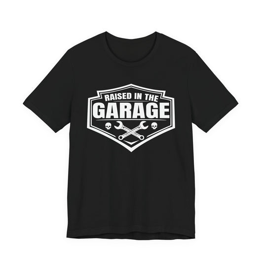 Black t-shirt with 'Raised in the Garage' graphic design on a white background